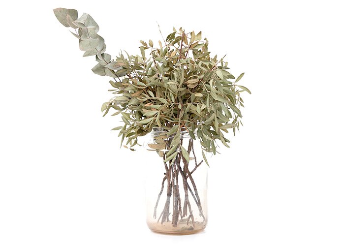 Vase with dried greenery and branches