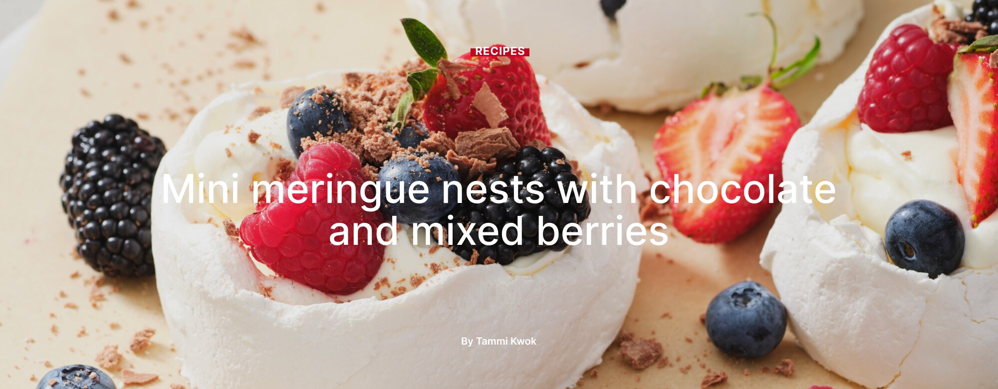 Mini meringue nests with chocolate and mixed berries