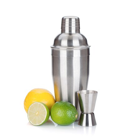 Cocktail shaker with lemon and lime