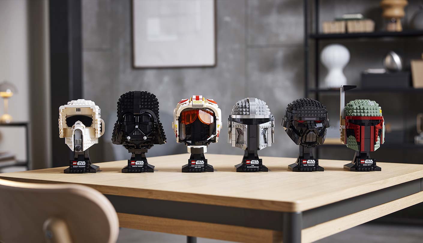 Row of Mandalorian helmets on display
