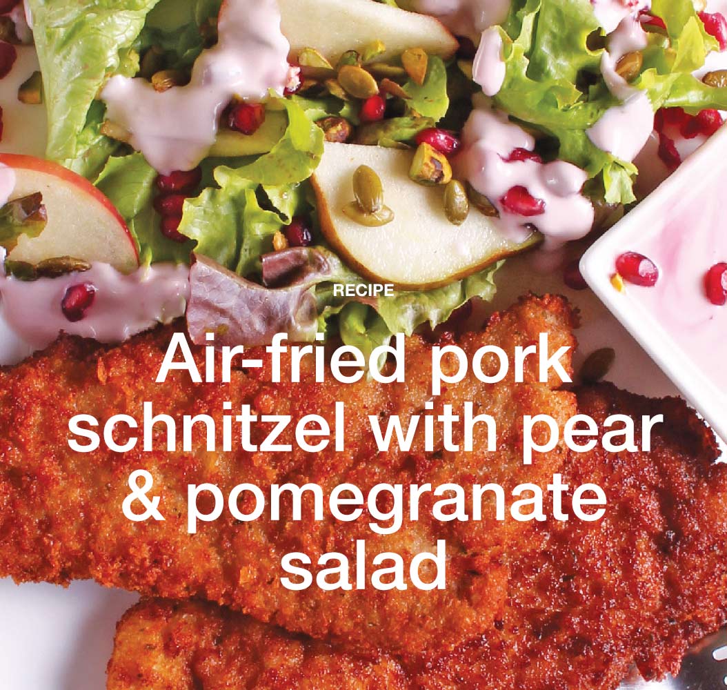 Air-fried pork schnitzel with pear & pomegranate salad