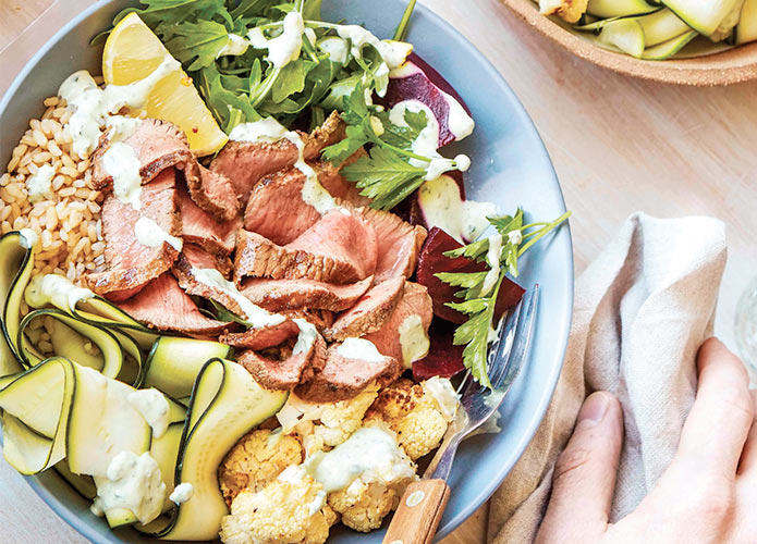 Lamb bowl with beetroot, cauliflower, and green tahini dressing