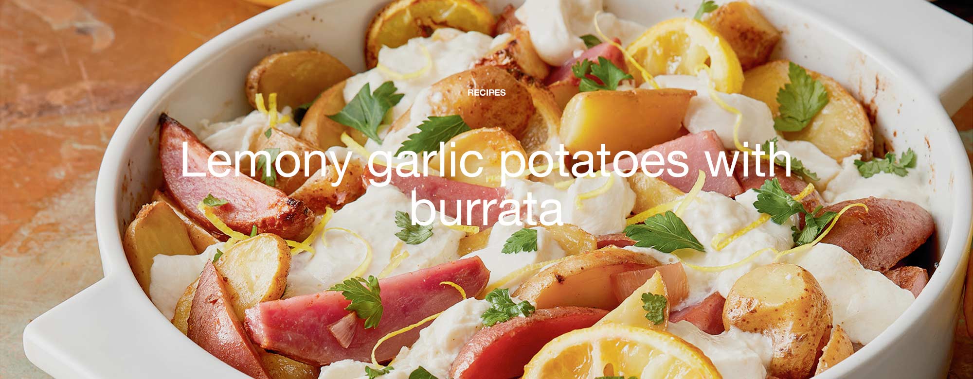 Lemony roasted garlic potatoes with burrata