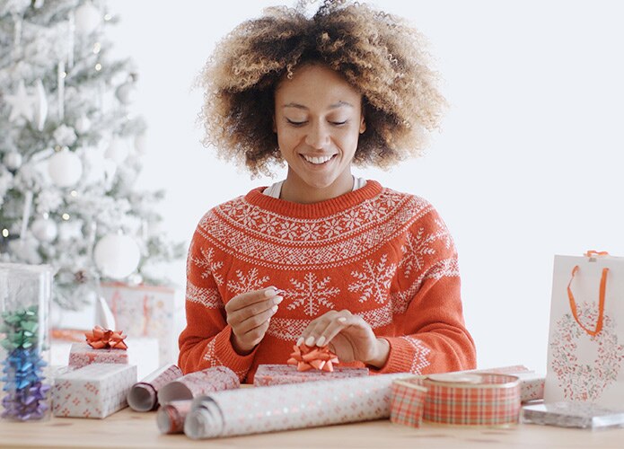 Woman wrapping presents