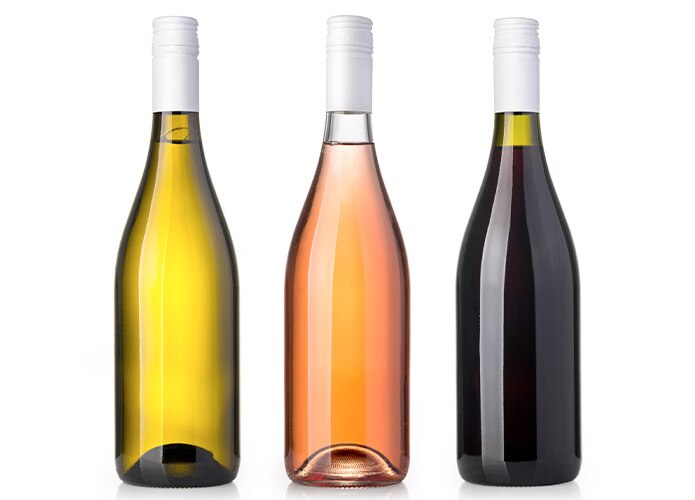 Three bottles of wine on white background