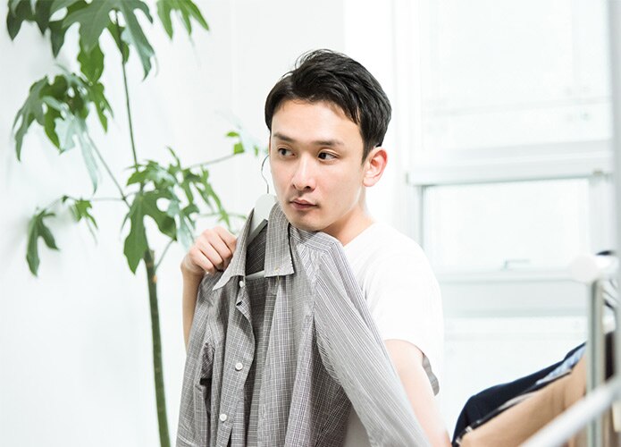 Man choosing shirt