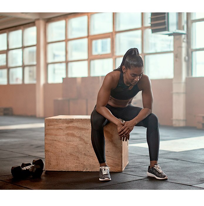 Woman taking a break from working out