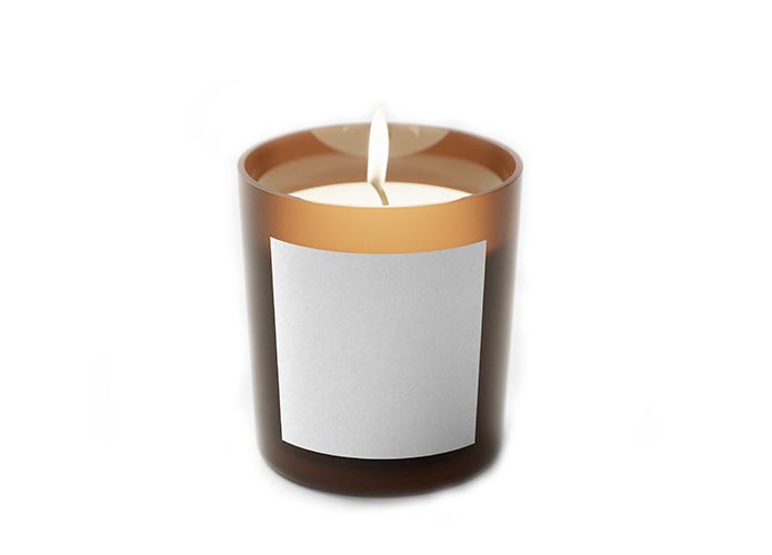 Scented candles on white background