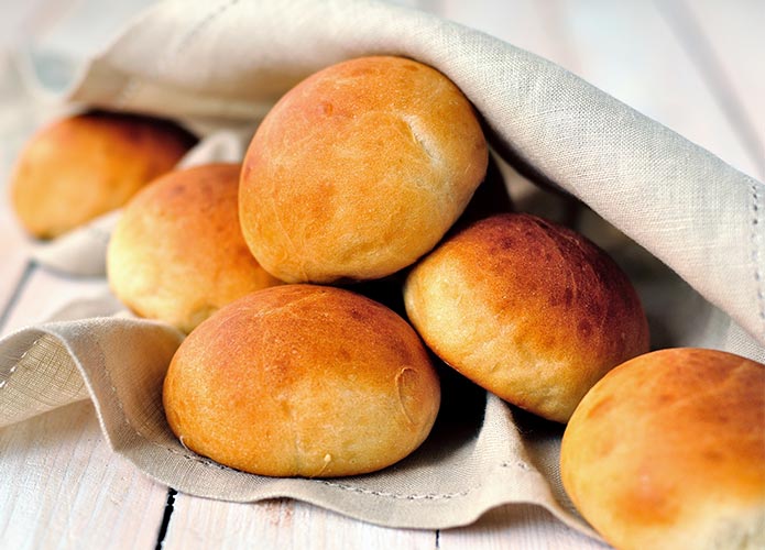 Dinner rolls in table cloth