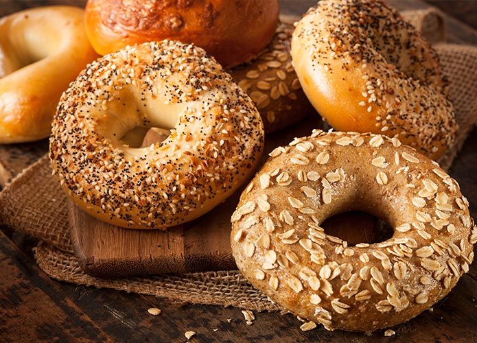 Seeded bagels on table