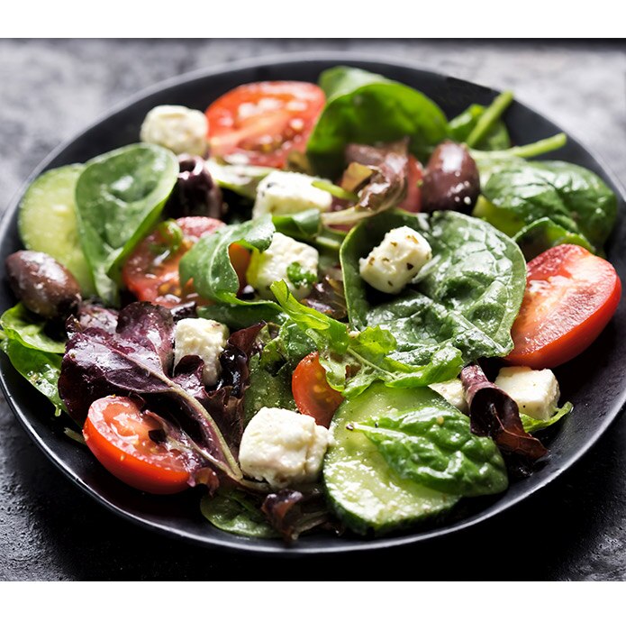 Baby Roma tomatoes in a salad