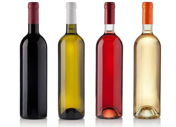 Group of friends toasting with red wine