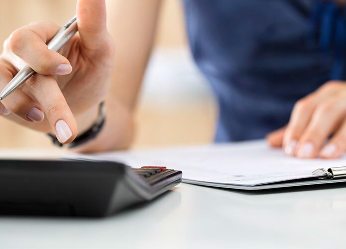 Woman making calculations