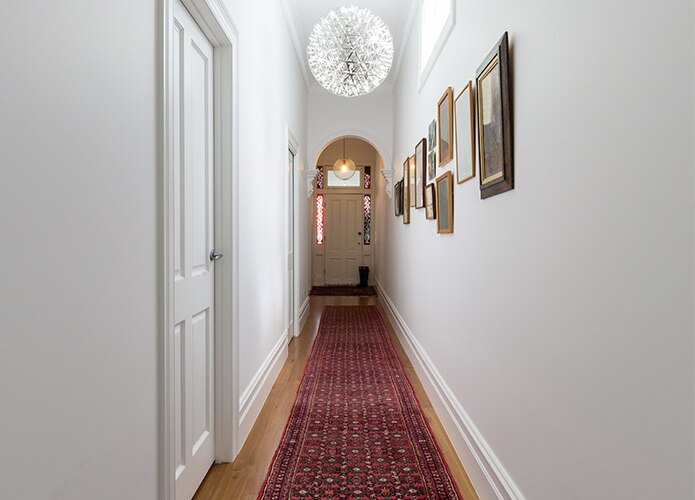 Hallway with rug