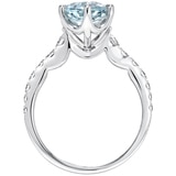 0.48ctw Diamond with Oval Aquamarine Ring