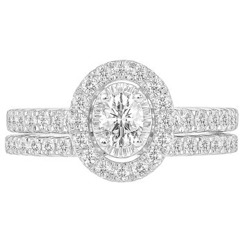 18KT White Gold 1.00ctw Round Diamond With Oval Centre Bridal Set