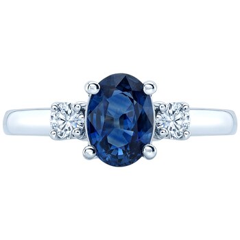 Oval Cut Sapphire and 2 Round Brilliant Cut Diamonds 0.20ctw 18KT White Gold Ring