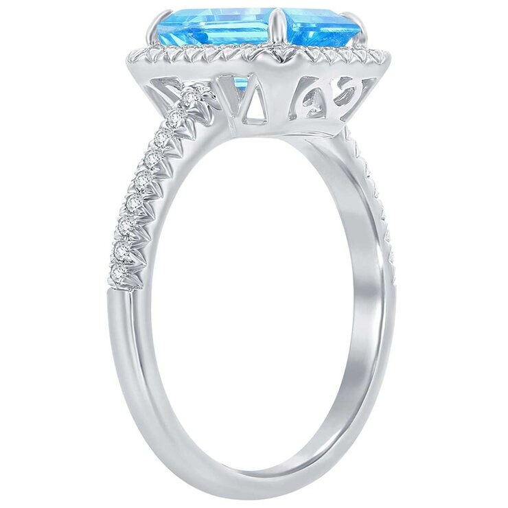 18KT White Gold Halo Blue Topaz 0.24ctw Diamond Ring 18KT White Gold Halo Blue Topaz 0.24ctw Diamond Ring