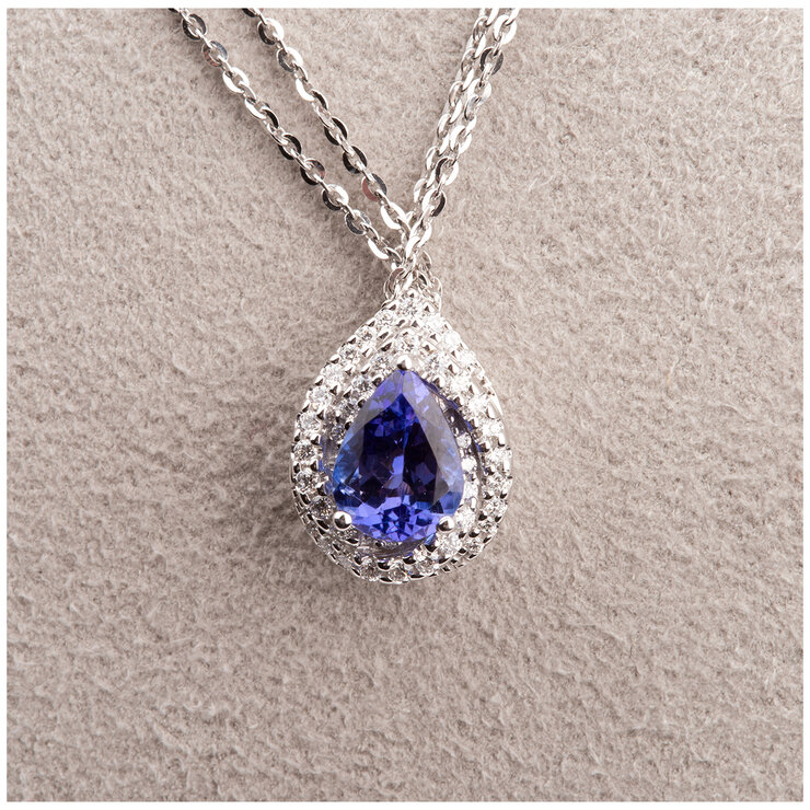 14KT White Gold 0.21ctw Diamond Tanzanite Pear Shape Pendant 14KT White Gold 0.21ctw Diamond Tanzanite Pear Shape Pendant
