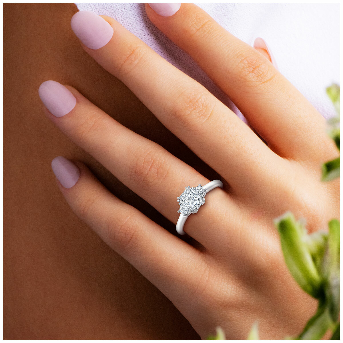 18KT White Gold 1.25ctw Three Stone Diamond Ring With 1ctw Centre