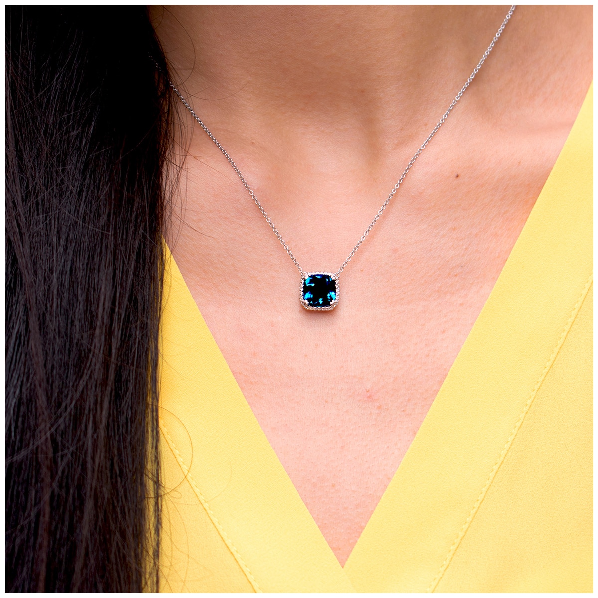 0.16ctw Diamond with Cushion London Blue Topaz Pendant