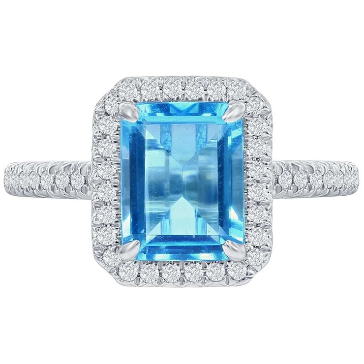 18KT White Gold Halo Blue Topaz 0.24ctw Diamond Ring 18KT White Gold Halo Blue Topaz 0.24ctw Diamond Ring